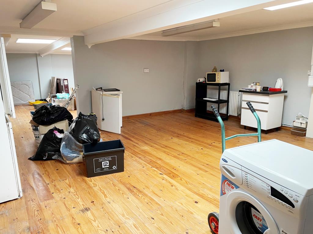 Lot: 85 - TWO FREEHOLD SHOPS PLUS WORKSHOP AND TWO FLATS ABOVE - Rear store area at 36c